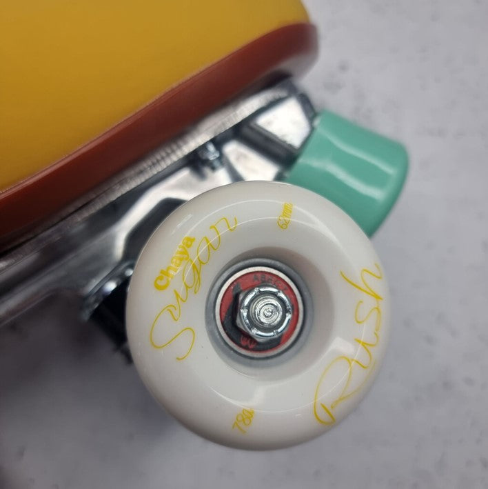 white 'sugar rush' 62mm 78a outdoor wheel with yellow writing