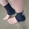 person wearing skate ankle guard protectors 
