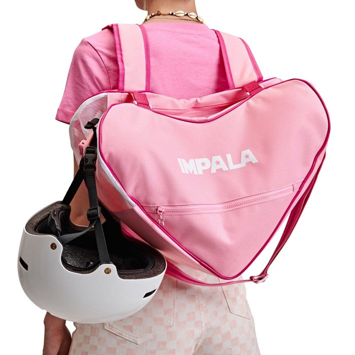 pink rollerskate love heart skate bag with helmet on outside 