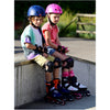 2 kids wearing rollerblade microblade skates 