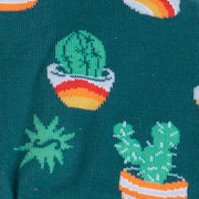 CLOSE UP OF CACTUS PATTERN ON FORREST GREEN SOCK