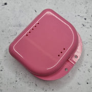 Pink container for mouthguard or dentures 