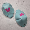 teal aqua roller skate toe caps with pink M for 'Moxi'