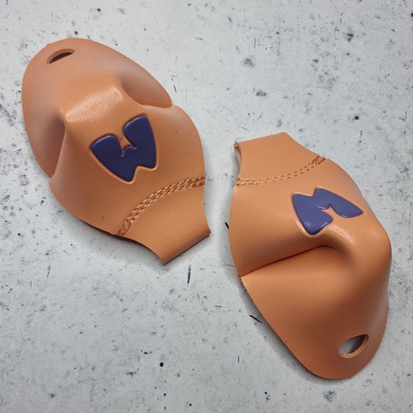 peach roller skate toe caps with purple M for 'Moxi'