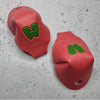 pink red roller skate toe caps with green  M for 'Moxi'