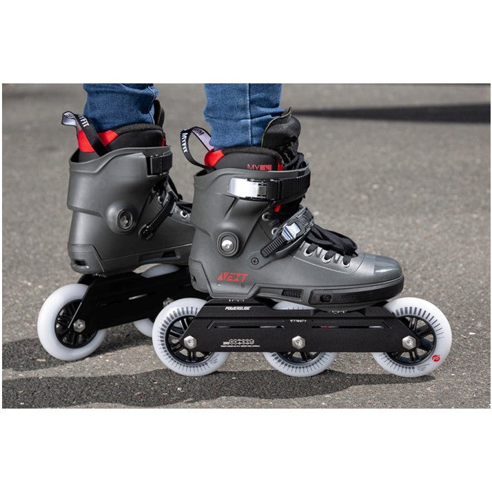 grey inline skates with 3 wheeled rocker set up 