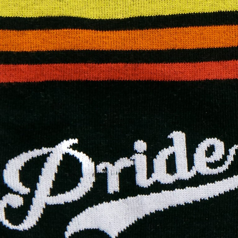 CLOSE UP OF RAINBOW STRIPE CREW SOCKS WITH TEXT "PRIDE"