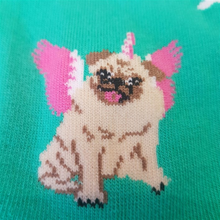 CLOSE UP OF PUG DOG UNICORN PATTERN ON TEAL SOCK