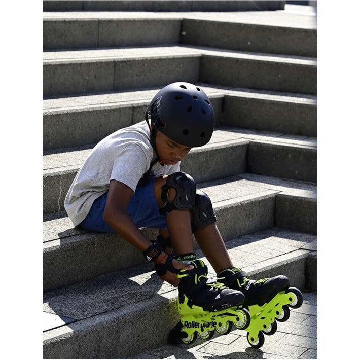 boy wearing inline rollerblade neon yellow black  72mm 