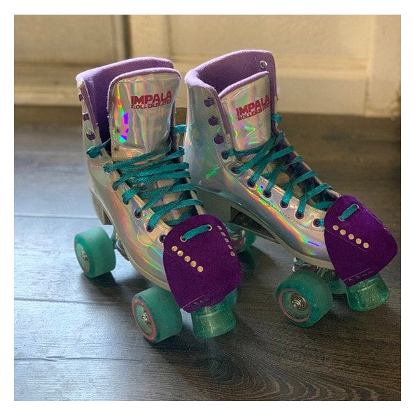 impala holographic roller skates with  purple taffy toe guard caps leather suede rollerstuff 