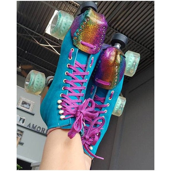 blue moxi lolly roller skates with rainbow metallic multi-coloured toe guard protectors with silver studs