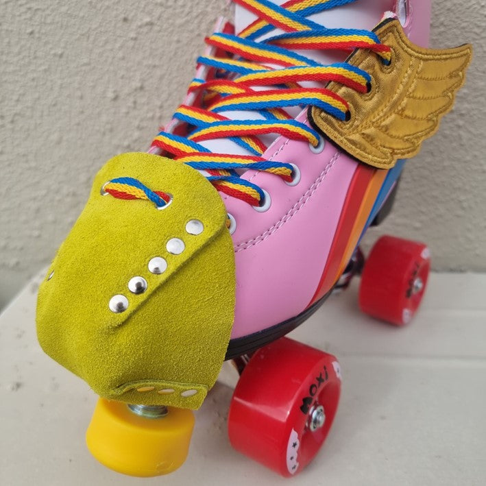 pink rainbow riders with bright yellow suede toe guard protectors with silver studs