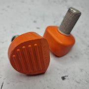 small orange roller skate toe brake 