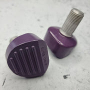 small purple rollerskate brakes 