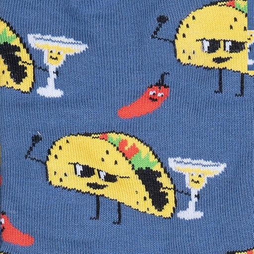 CLOSE UP OF TACOS HOLDING DRINK AND WEARING GLASSES ON BLUE CREW SOCK