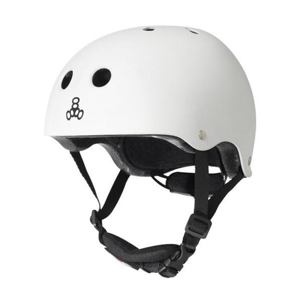 white helmet, black straps, chin protection, adjustable dial on back 