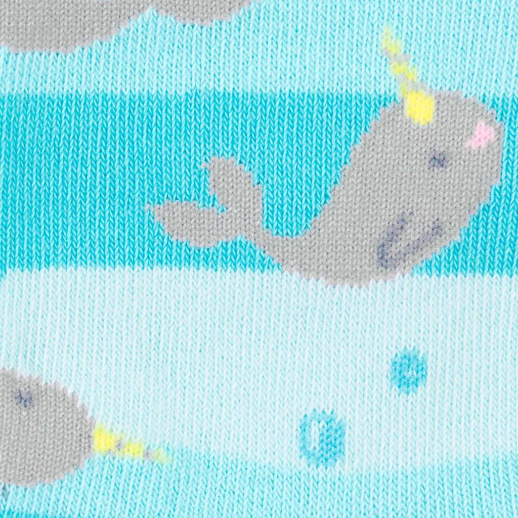 CLOSE UP OF CUTE NARWHAL PATTERN ON BLUE AND TEAL STRIPE SOCK