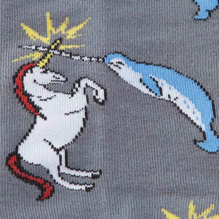 CLOSE UP OF GREY CREW SOCKS WITH PATTERN OF UNICORN AND NARWHAL BATTLING